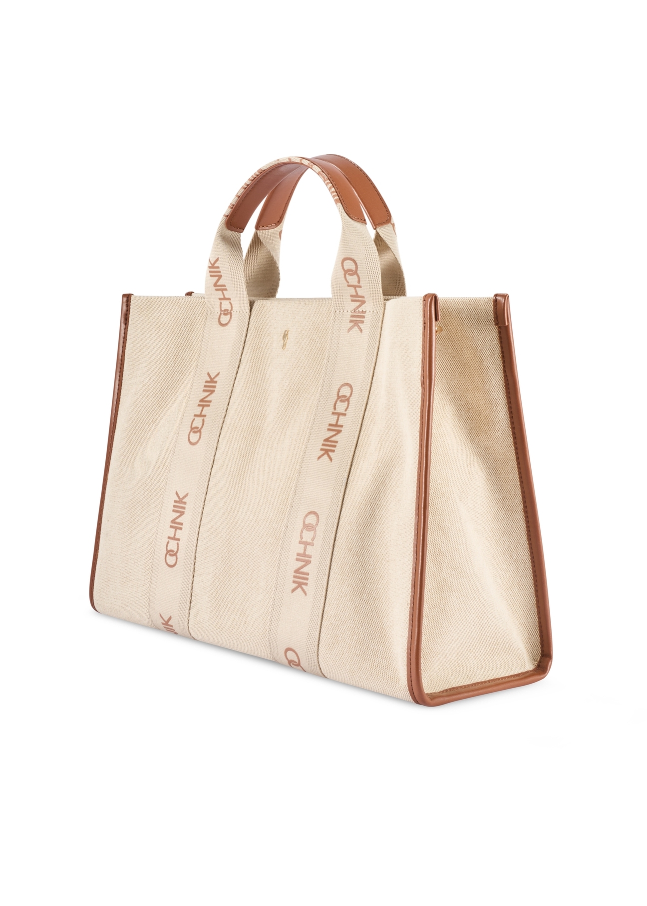 Beżowa damska torebka typu tote bag TOREN-0288A-1E(W26), widok produktu skosem na białym tle.