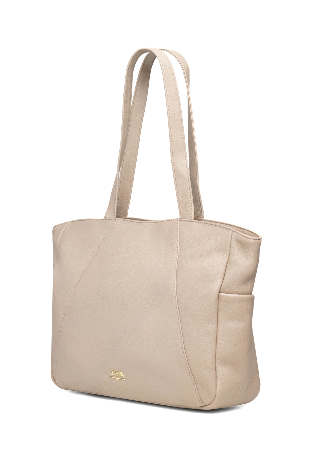 Beżowa skórzana torebka shopper damska TORES-1255-1A(W26), widok produktu skosem na białym tle.