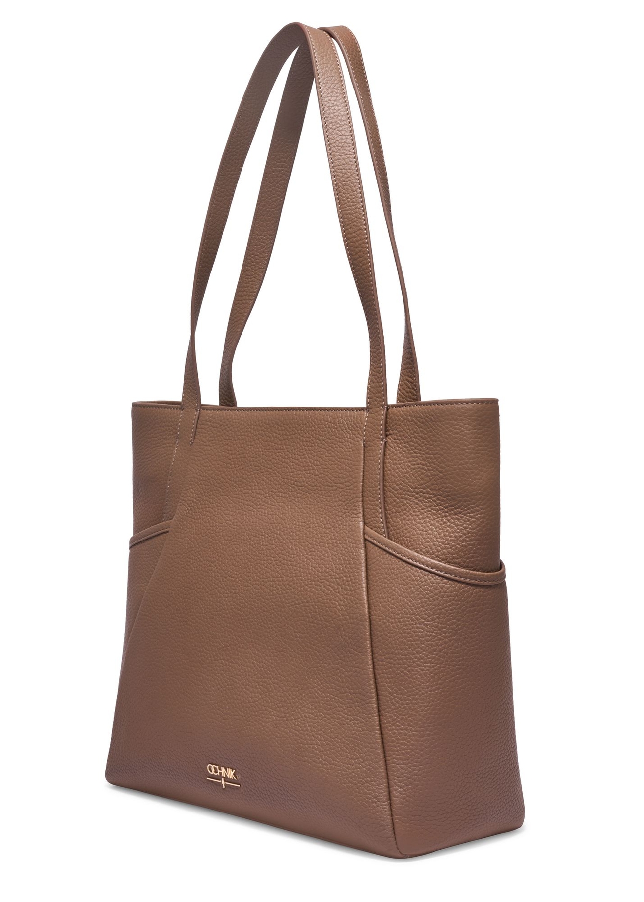 Skórzana torebka shopper w kolorze chłodnego beżu TORES-0980-1K(Z26) - widok produktu po skosie, na białym tle.