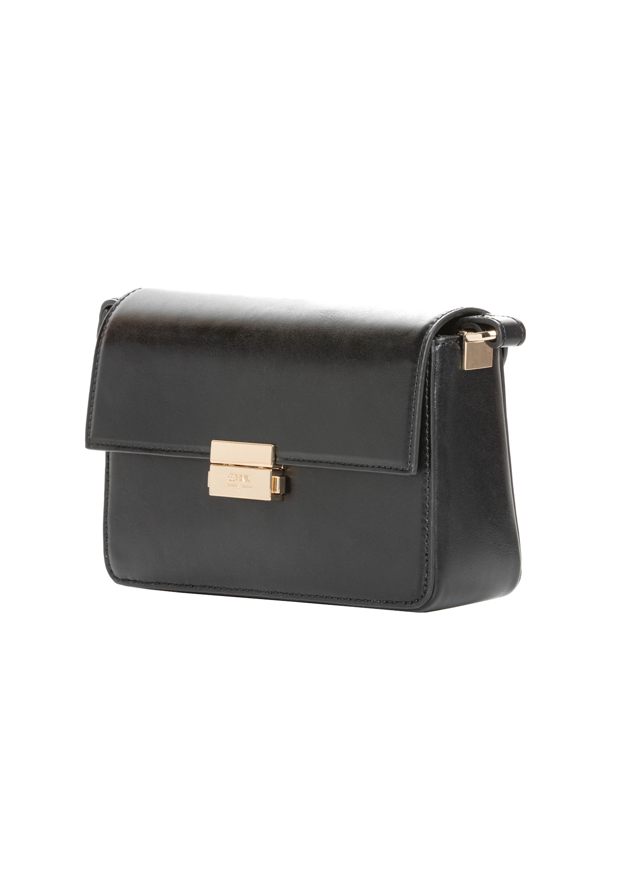 Elegancka czarna torebka damska TOREC-1251-99(Z26), widok produktu skosem na białym tle.