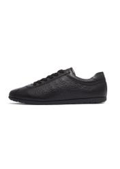 Czarne skórzane sneakersy damskie BUTYD-1293-9I(Z26), widok produktu z boku na białym tle.