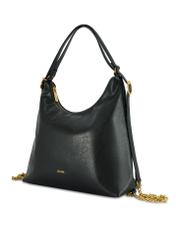 Czarna torebka damska shopper TOREC-1083-99(Z25), widok produktu skosem na białym tle.