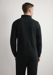 Czarna bluza męska ze stójką BLZMT-0080-99(W26) - widok produktu z tyłu, na modelu, na jasnym tle. 